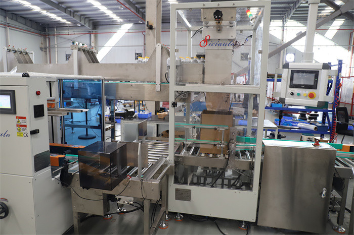 ultimo caso aziendale circa Bottiglia - Alimentare - Incartonatrice - Linea Incartonatrice - Soluzione Drop Load per bottiglia da 1L -SICIAUTO